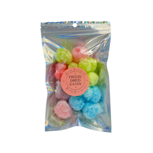 Freeze-dried Happy Farmers hard candies in colorful fruit flavors packaged in a mylar bag.