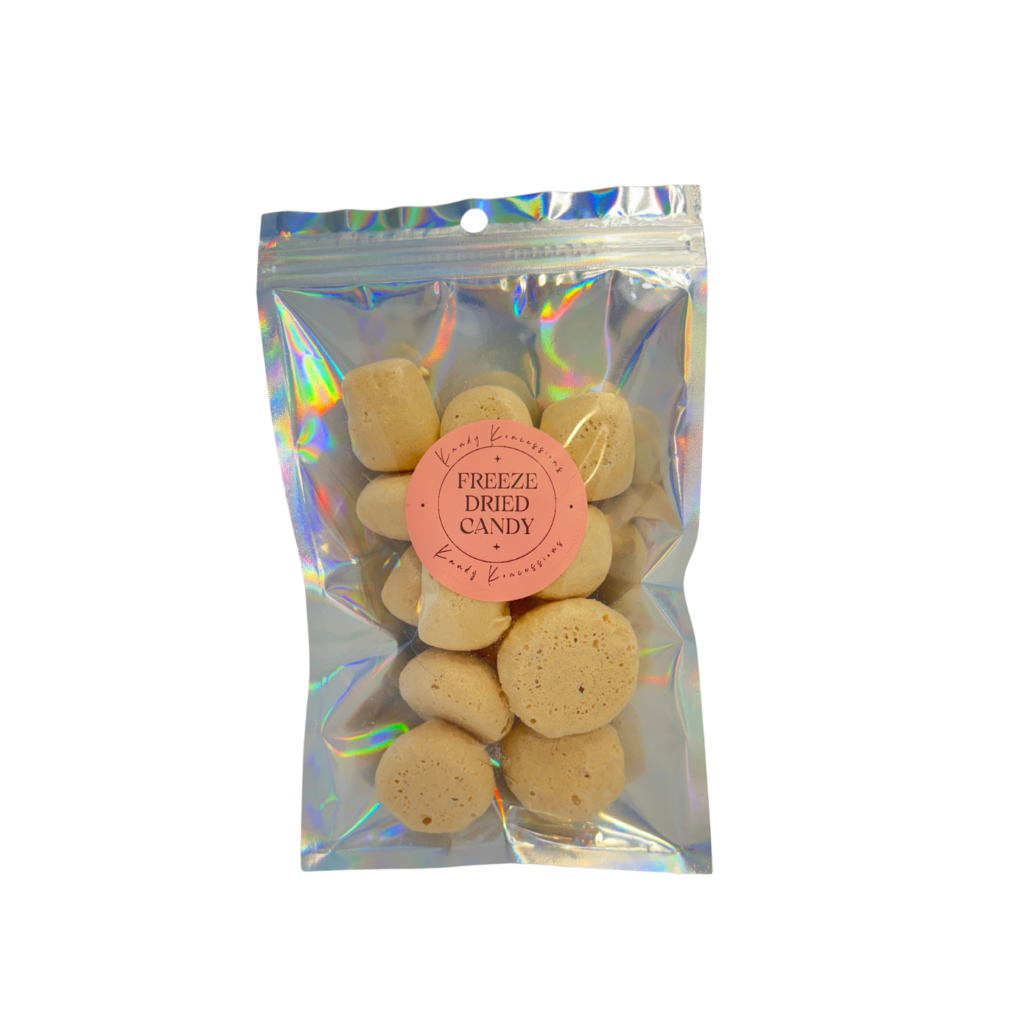 Honey bits are featured in a mylar bag with a clear front cover, showcasing the airy, textured, tan candies.