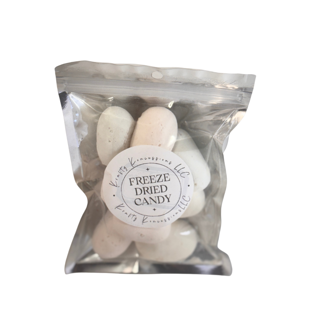 Pale pink, blue, and purple puffy candies in a silver mylar bag.